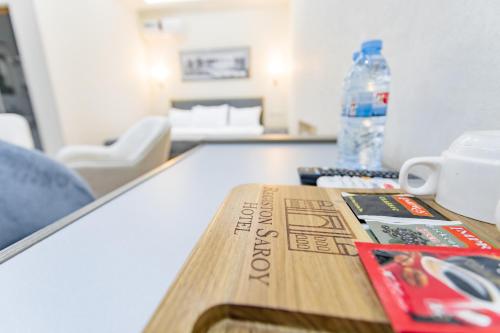 a book sitting on a table in a room at Registon Saroy Hotel in Samarkand
