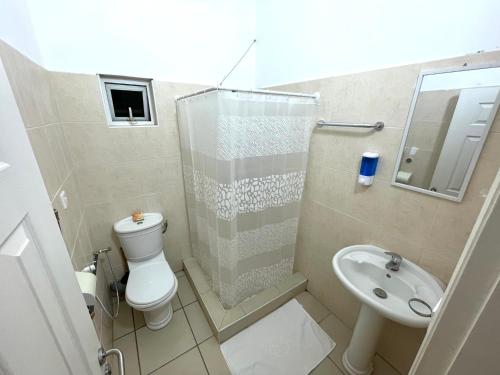 Um banheiro em Lovely Apartment in Flic-en-Flac