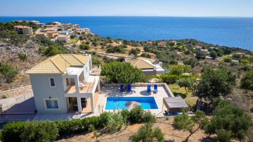 an aerial view of a villa with a swimming pool at Astra Villas in Skala Kefalonias