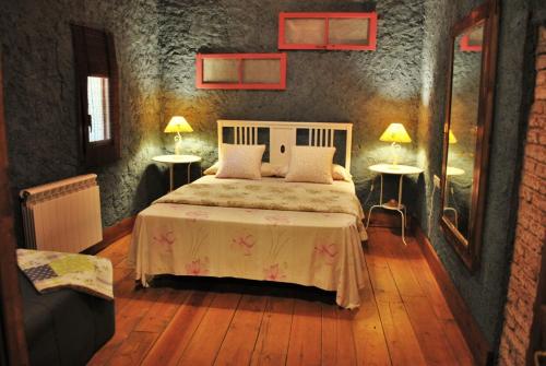 Katil atau katil-katil dalam bilik di Masia El Canalot - Molí Del Pont