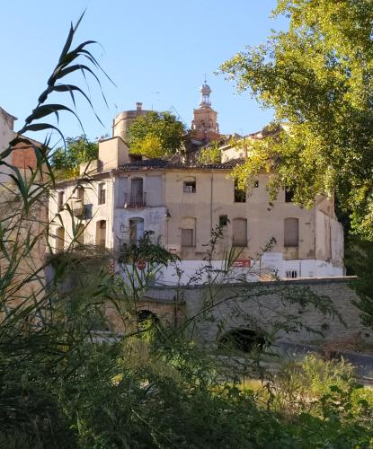 an old building with a tower on top of it at B&B Casa Josa in Ontinyent