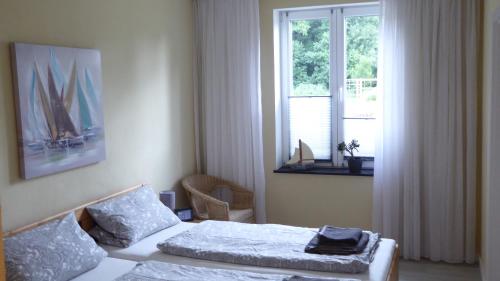 Katil atau katil-katil dalam bilik di Ferienwohnung Goldenitz