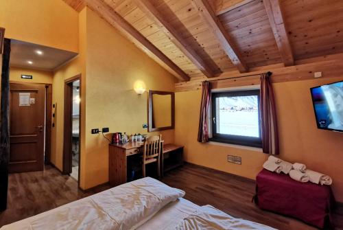 Ένα ή περισσότερα κρεβάτια σε δωμάτιο στο Agriturismo La Poina