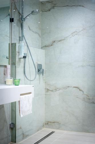 Koupelna v ubytování Kb Hotel