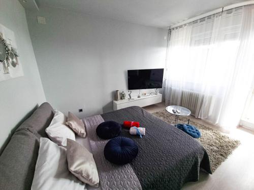 Giường trong phòng chung tại Apartment Apex penthouse self check-in
