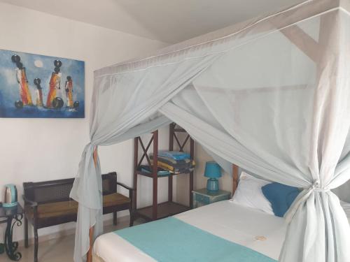 Кровать или кровати в номере FaDu’GH