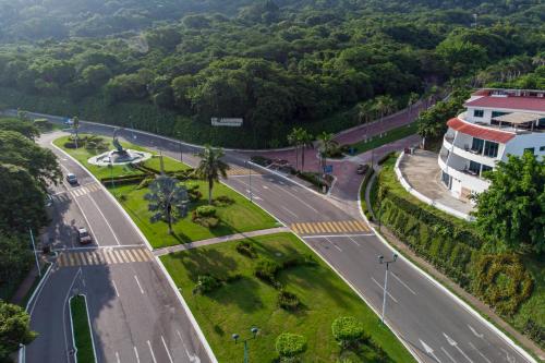 an aerial view of a street with a road at LA LOMA SUITES in Ixtapa