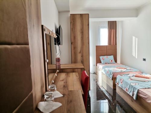 Postel nebo postele na pokoji v ubytování HOTEL EMA