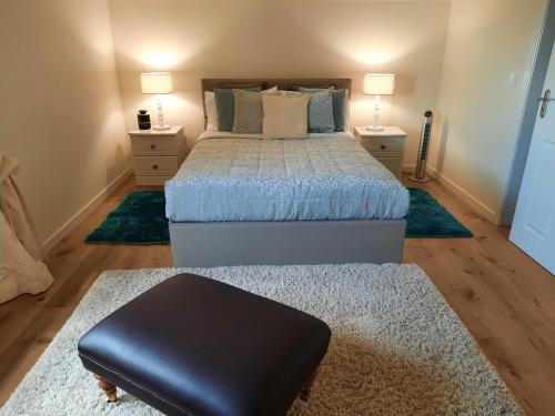 a bedroom with two beds and two rugs at Casa Del Mar in Ponta do Sol