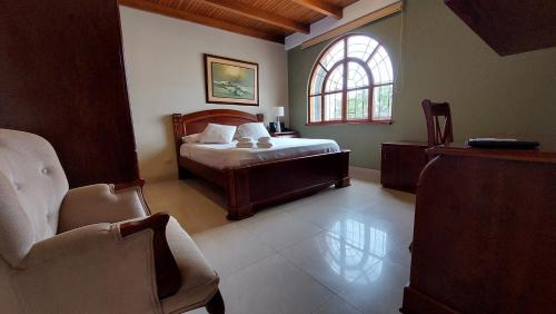 Postel nebo postele na pokoji v ubytování Hotel Voyager Manta