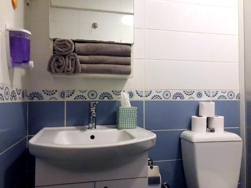 a bathroom with a sink and a toilet at 3+1 NEW Kadıköy Istanbul entire flat furnished apartment for rent in the heart of Kadikoy! in Istanbul