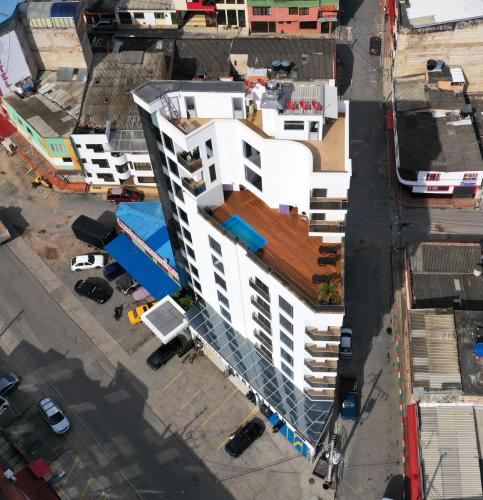 an overhead view of a white building with a red roof at Turrim Dei Hotel Boutique in Barbosa