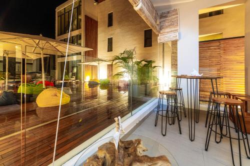 a room with a view of a building at ONE BAY Residence Apartment 3 Luxury Unit Grand Baie in Pereybere