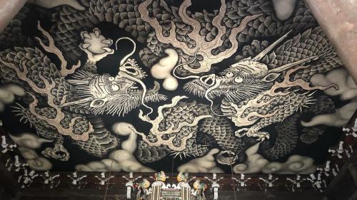 a painting of dragons on the ceiling of a building at Kyoto Inn Gion in Kyoto
