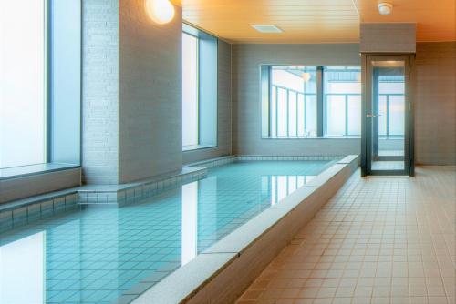 Kolam renang di atau dekat dengan HOTEL AMANEK Asahikawa