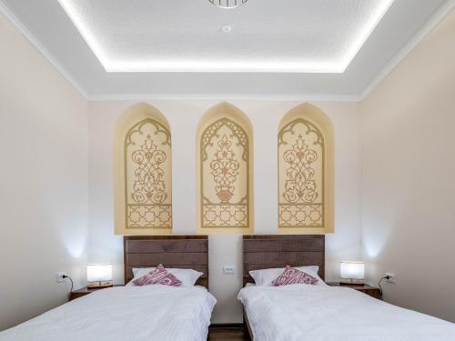 Voodi või voodid majutusasutuse Grand Vizir Hotel toas