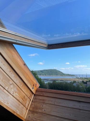 a window with a view of the ocean at No.9 in Inverness