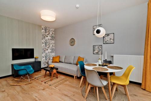 TV a/nebo společenská místnost v ubytování BlueApart Apartamenty Hotelowe Nexo