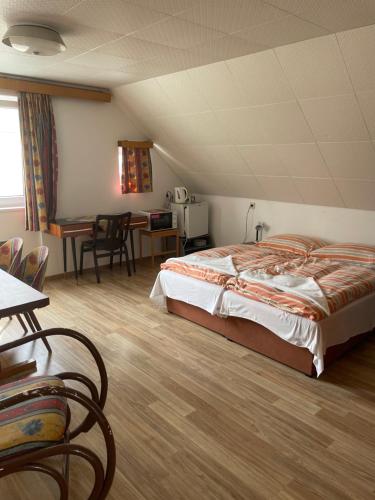 Postel nebo postele na pokoji v ubytování Penzion Fontána