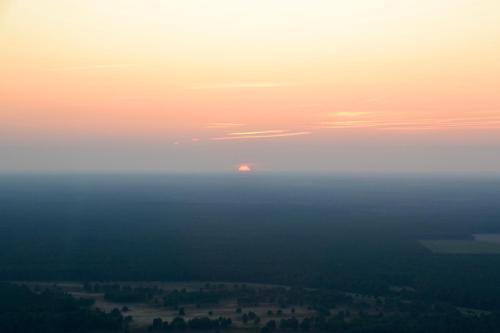 an aerial view of a foggy field at sunset at Celle Old Town Hideaway in Celle