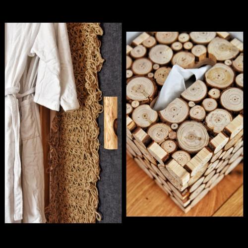 a basket filled with fire wood next to a table at Angelos Design Suites in Patitiri