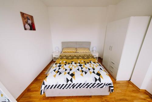 Ένα ή περισσότερα κρεβάτια σε δωμάτιο στο Apartman Oaza