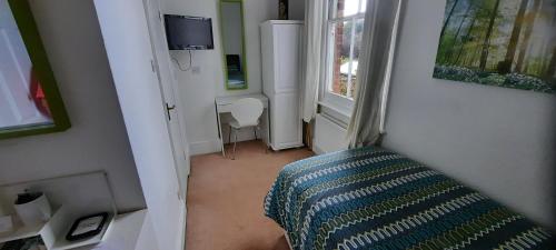 TV a/nebo společenská místnost v ubytování Colebrook Guest House