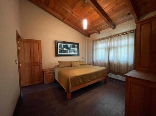 Giường trong phòng chung tại Cabañas Mazzatl 6 pax