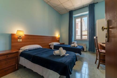 Postel nebo postele na pokoji v ubytování Hotel Beauty Palace - Vertex Group