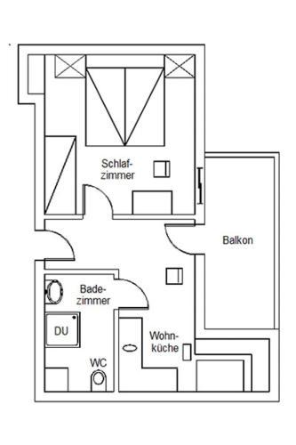 a black and white floor plan of a house at Ferienwohnungen Monika Winter in Kleinarl