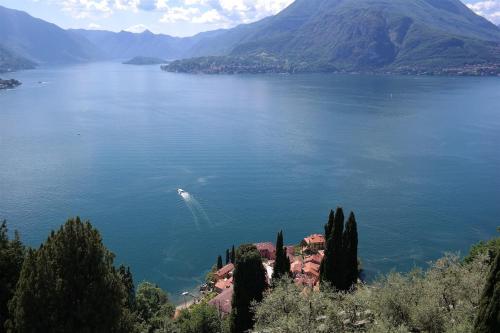 a large body of water with a boat in it at Villa Silvana in Perledo