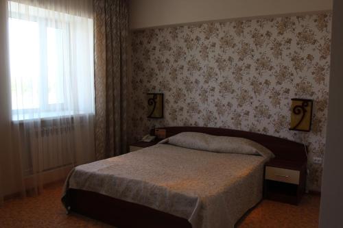 Katil atau katil-katil dalam bilik di Hotel Zumrat