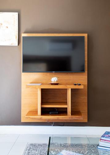 Televisyen dan/atau pusat hiburan di Marine Square Luxury Suites