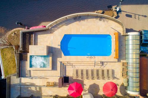 an overhead view of a building with a swimming pool at Sitzmark Vail in Vail