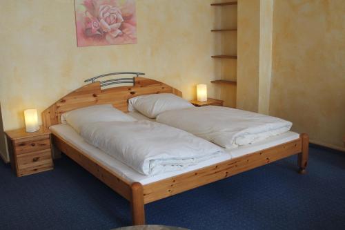 Säng eller sängar i ett rum på City Apartment Hotel Hamburg