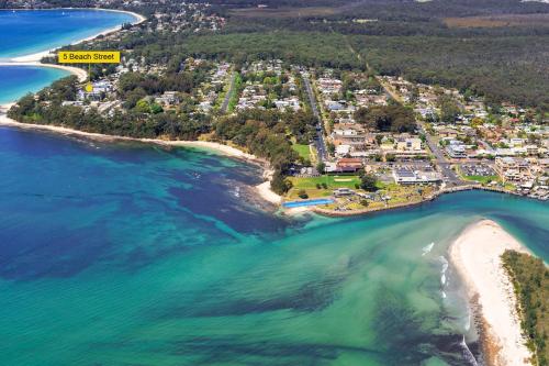 an aerial view of the beach and the ocean at Husky 56 Beachfront Villa's - great location on the beach in Huskisson