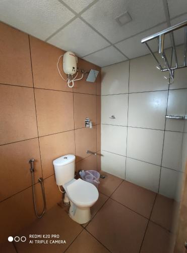 Kylpyhuone majoituspaikassa Hotel Sree Gokulam Apartments