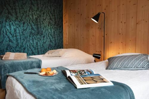 Postel nebo postele na pokoji v ubytování Duplex La Vue du Lac