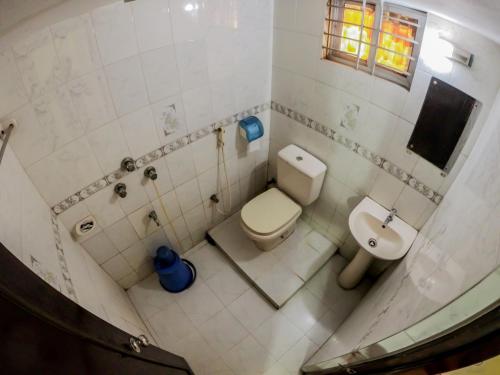 an overhead view of a bathroom with a toilet and sink at HOTEL HERITAGE in Chittagong