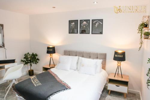 Postelja oz. postelje v sobi nastanitve Unique Accommodation Liverpool - Luxury 2 Bed Apartments , Perfect for Business & Families, Book Now