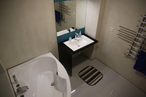 Koupelna v ubytování Spacious luxury apartment in the city centre