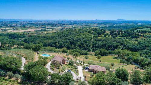 an aerial view of an estate with a mansion at BOSSONCINA 8&1, Emma Villas in Montepulciano