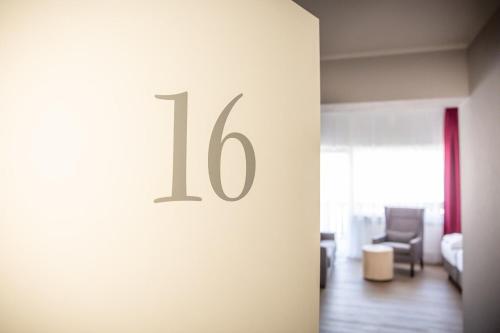 a room with a wall with the number on it at Hotel Spessartstuben in Haibach