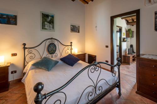 Giường trong phòng chung tại La Casa di Smilla - (Bevagna)