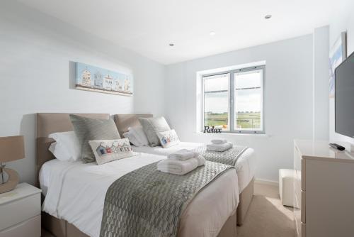 Postel nebo postele na pokoji v ubytování Ollies 4 Cribbar