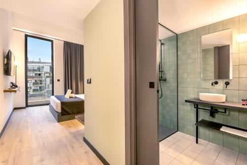 Un baño de Hotel Orangine