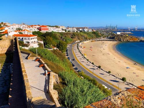 a view of a beach and the ocean at Beach & Castle - Sines Apartment in Sines