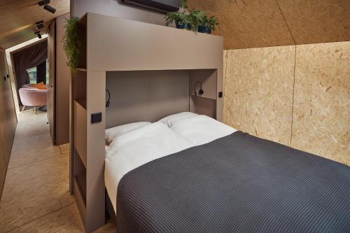 Кровать или кровати в номере KampinaStaete Diamond Suite