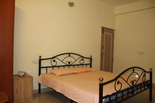 Posteľ alebo postele v izbe v ubytovaní Windsor Apartments