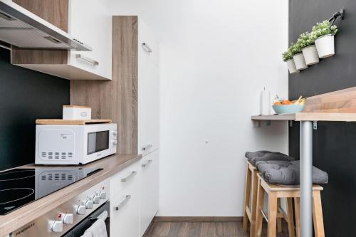 Küche/Küchenzeile in der Unterkunft Vienna 15 Design Apartment